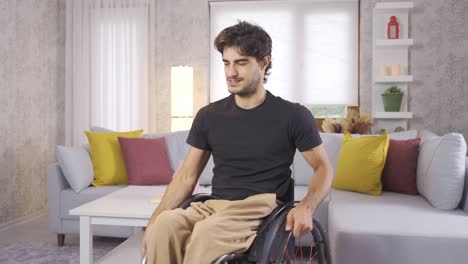 Behinderter-Mann-Sitzt-Zu-Hause-Im-Rollstuhl.-Der-Behinderte-Mann-Ist-Traurig.